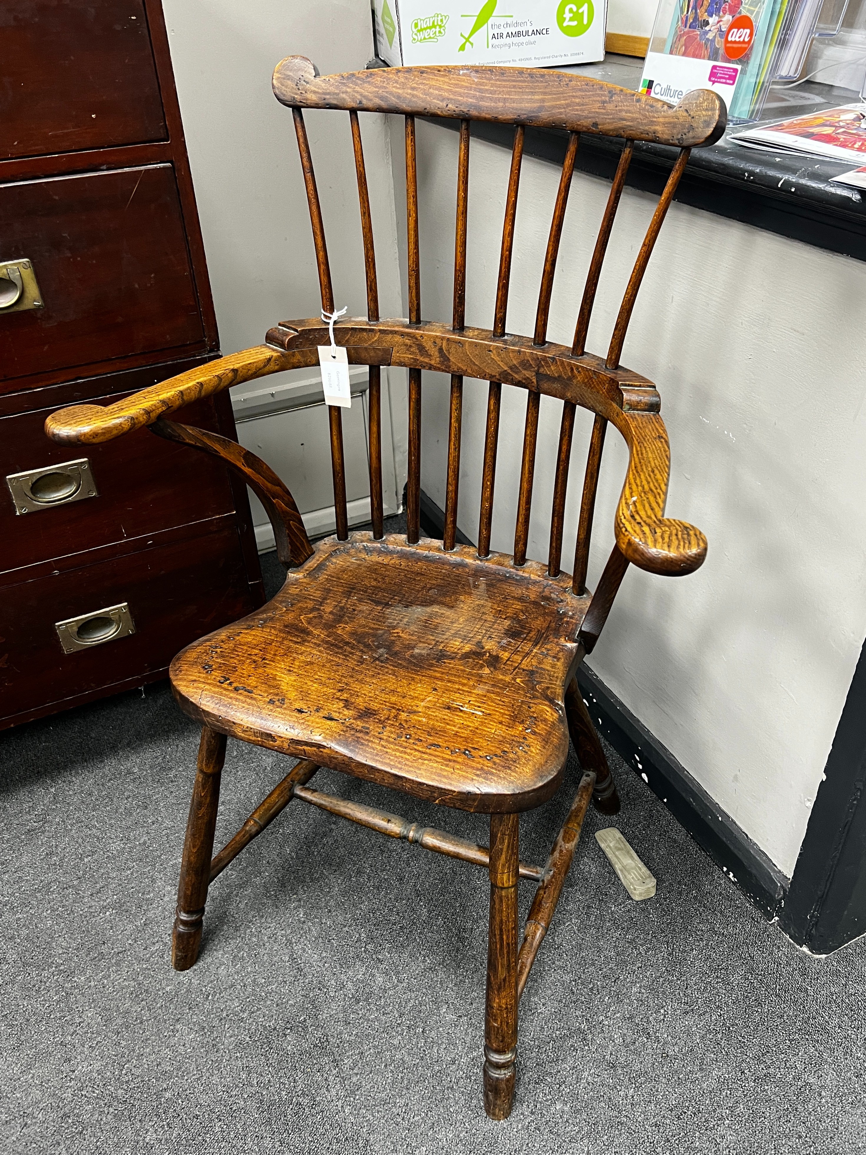 A mid 19th century and later Windsor comb back elbow chair, width 64cm, depth 39cm, height 97cm